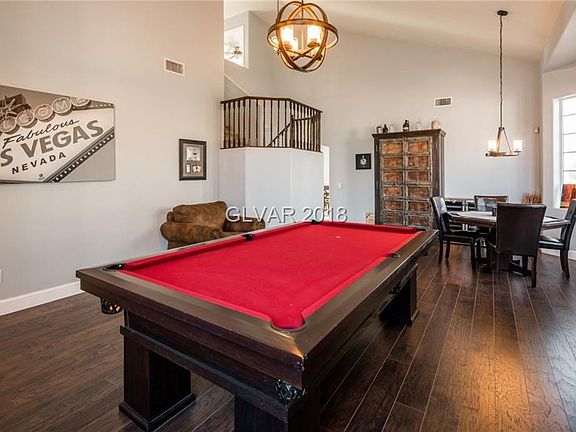 Living/Dining Room Front Entry. Vaulted Ceilings & Beautiful Wood/Tile Flooring