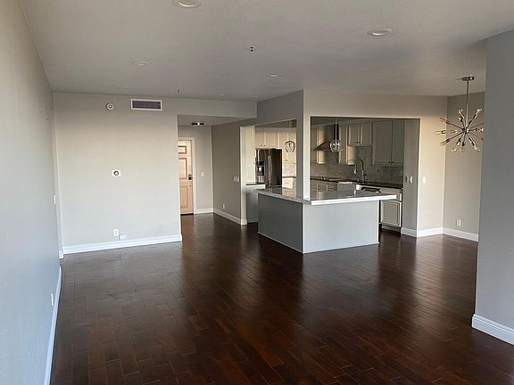 Looking back at the front door from living room