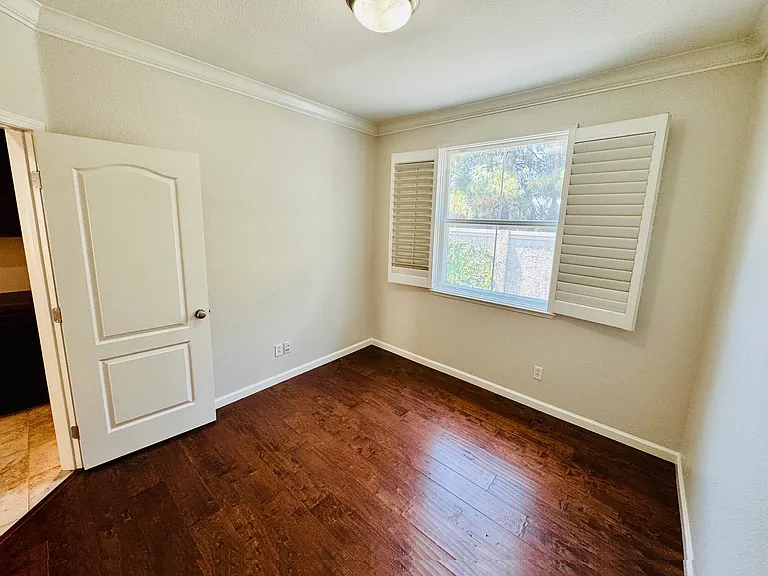 Bedroom on second floor next to kitchen (alternate view)