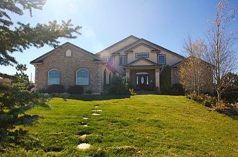 Beautiful semi-custom former Parade home on 2.5 acres