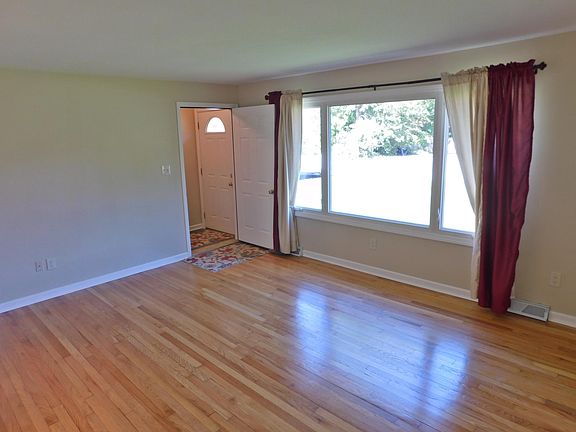Gleeming Hardwood Floors, gracious sized living room