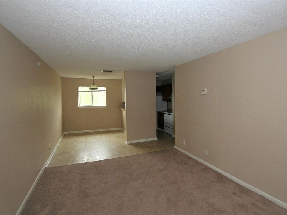 Living room opens up to the dining area