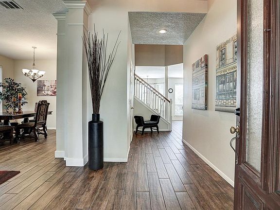 Beautiful "wood-look" tile floors span throughout the 1st floor
