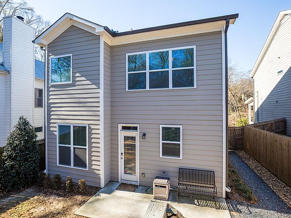 Small fenced in back yard and back entry from detached garag