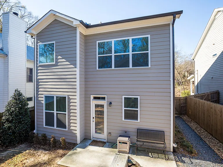 Small fenced in back yard and back entry from detached garag