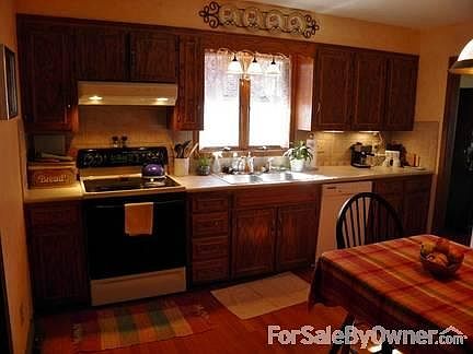 Formal Dining Room
						:
						Another bright and airy room. House has newer flooring throughout.