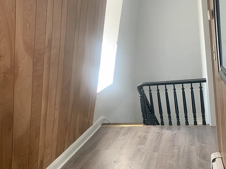 Wooden flooring throughout