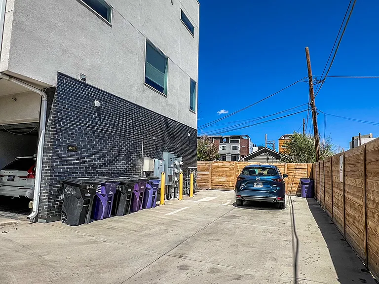 There is garage parking as well as an ADDITIONAL 4 SPOTS! These are associated with my property and you can use this parking for larger vehicles or friends/guests.
