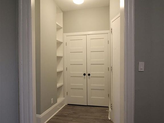 Foyer with double door coat closet