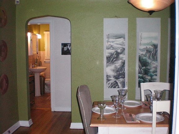 View from Dining Room into bedroom/bathroom hallway