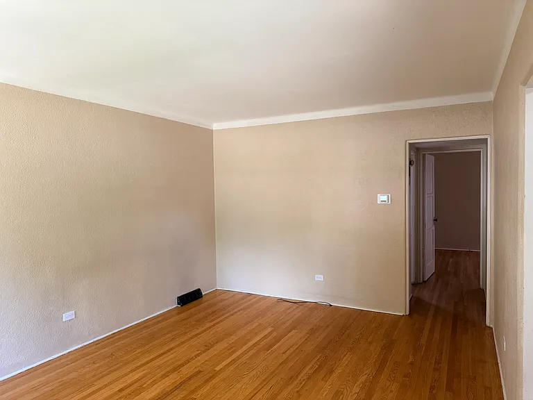 1 spacious bedroom with hardwood floors