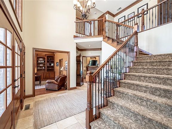 Grand Entry with recently added new Ballisters and new Plank Flooring