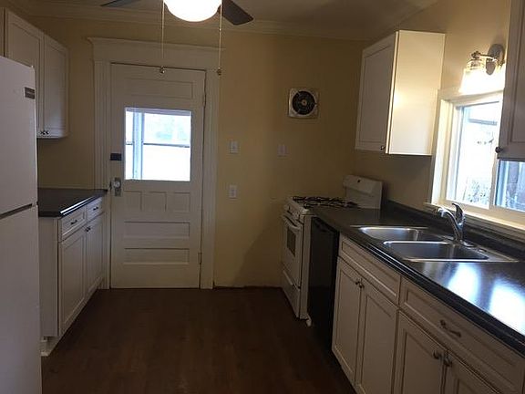 Newly remodeled kitchen has access to back porch