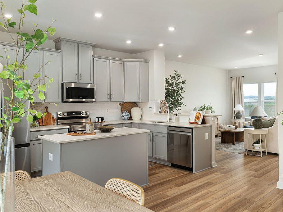 Welcome home to Wellford Park, the only townhomes with 4 bedrooms and a finished lower level include