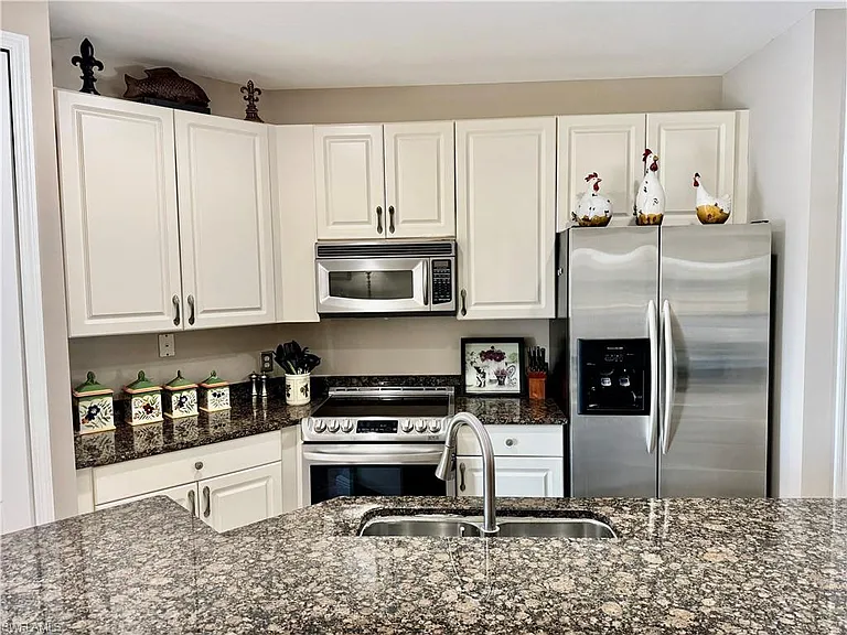 1390 Sweetwater Cv #203 — Photo 9
