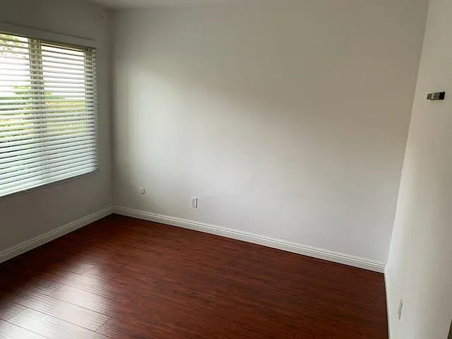Bedroom with professionally installed TV wall mount.