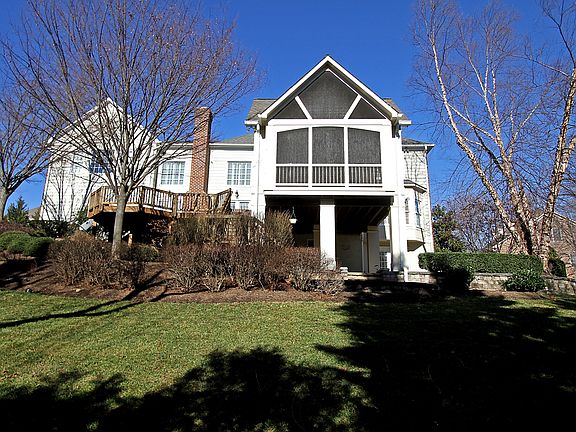 Rear screened-in porch