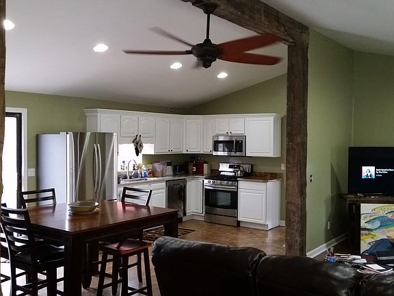 Open concept kitchen/dining/living room