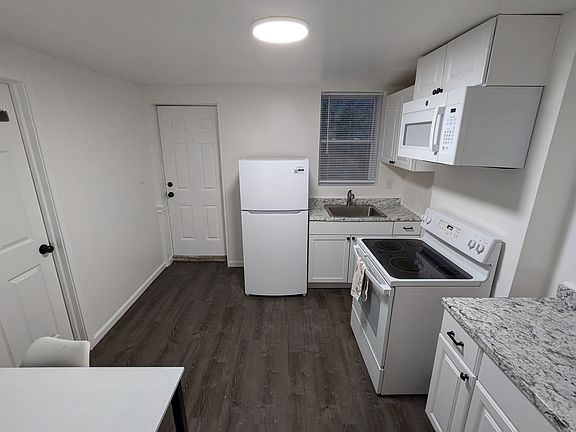 Kitchen facing front door.