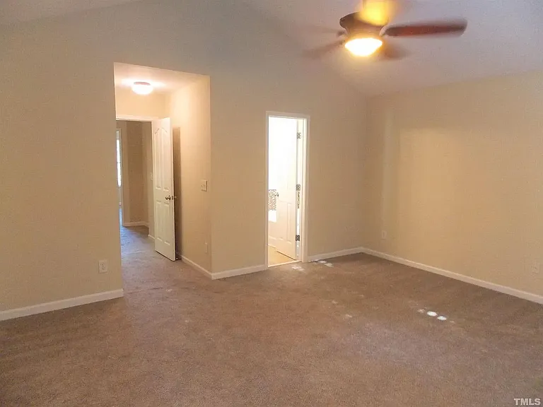 Primary Bedroom with vaulted ceilings on the second floor