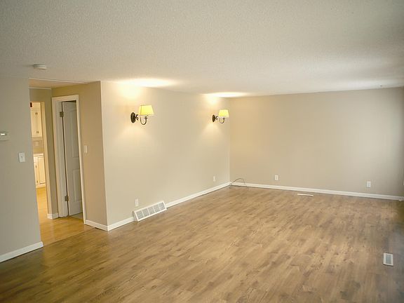 Spacious Family Room (hall leads to kitchen and the door is a half bath)