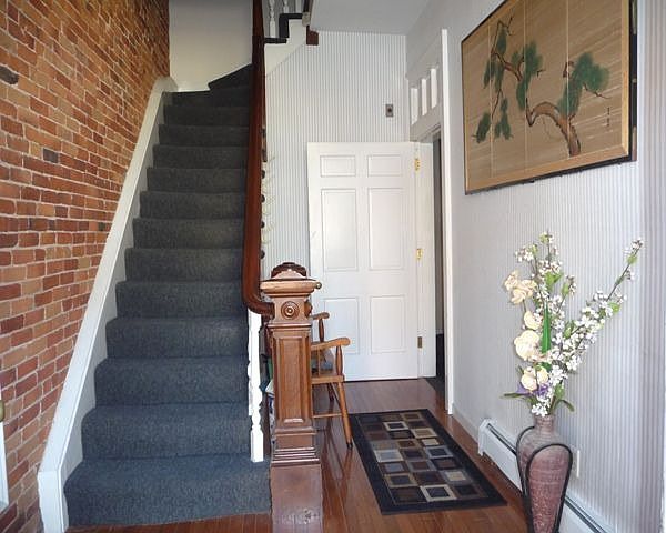 Entrance, exposed brick & original period details