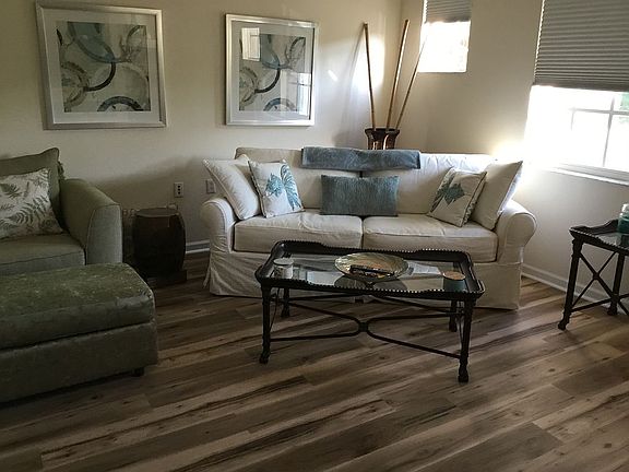 Den with new wood flooring