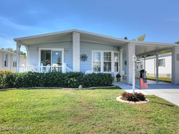 376 Dolphin Cir, Barefoot Bay, FL 32976