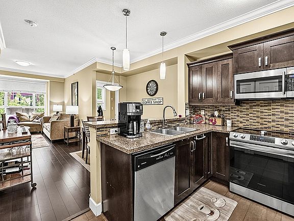 2nd image of 13897 Fraser Hwy #411