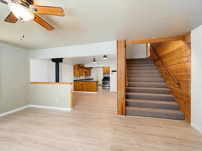 wide stairway to bedrooms and bathroom