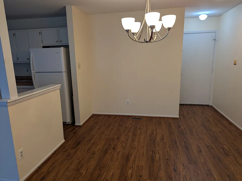 Dining area with dimmable lighting. Perfect for a table for four. The coat closet is next to front door.
