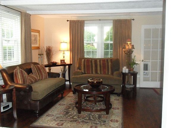 Living room  new windows hardwood floors
