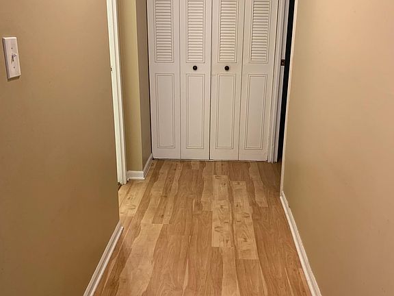 Hallway with linen closet