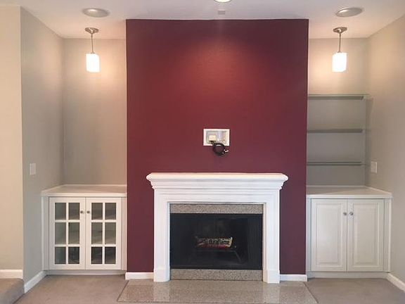 Fireplace with tech center and showcase