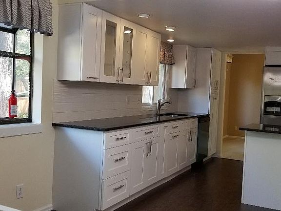 New kitchen cabinets with granite countertop