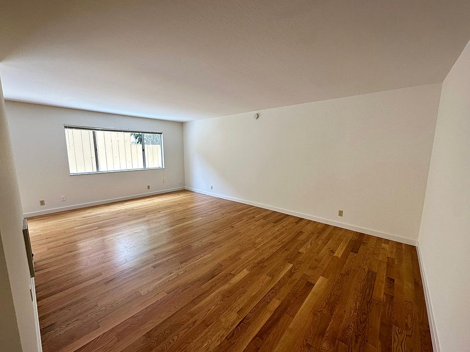 living room upon entry, out window is patio