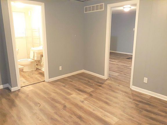 Apt 19 - Sleeping area & living room area - the eat-in kitchen is through the doorway