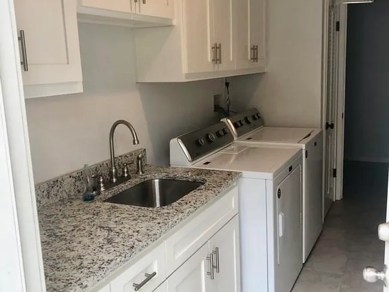 laundry, utility room with plenty of cabinets/storage