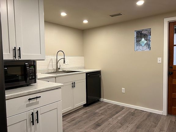 Sink and dishwasher.