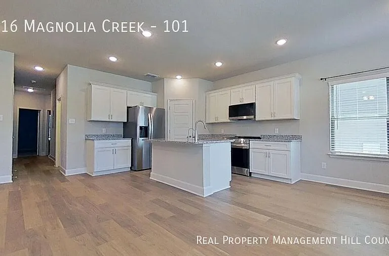 7216 Magnolia Vlg #101 — Photo 2