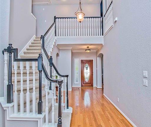 This picture perfect staircase will be the landing spot for many years of family photos.