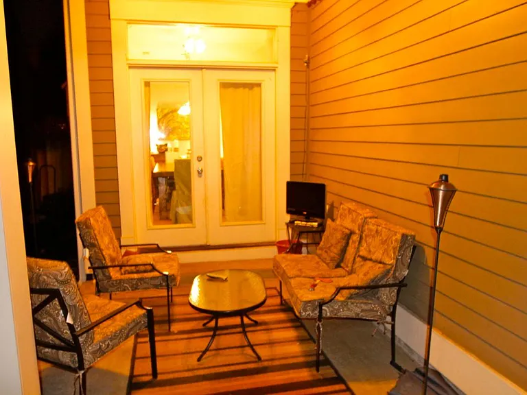 Back private patio over looking the fenced in yard. This is great for pets and kids.