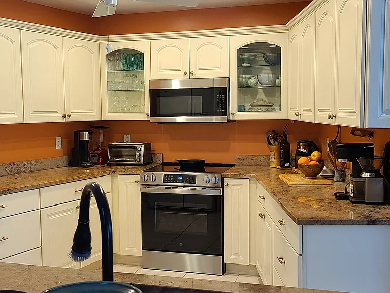 Glass top range and microwave.