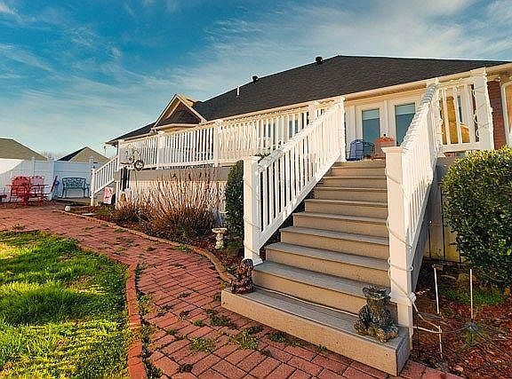 Garden grass with all-weather north deck stairs