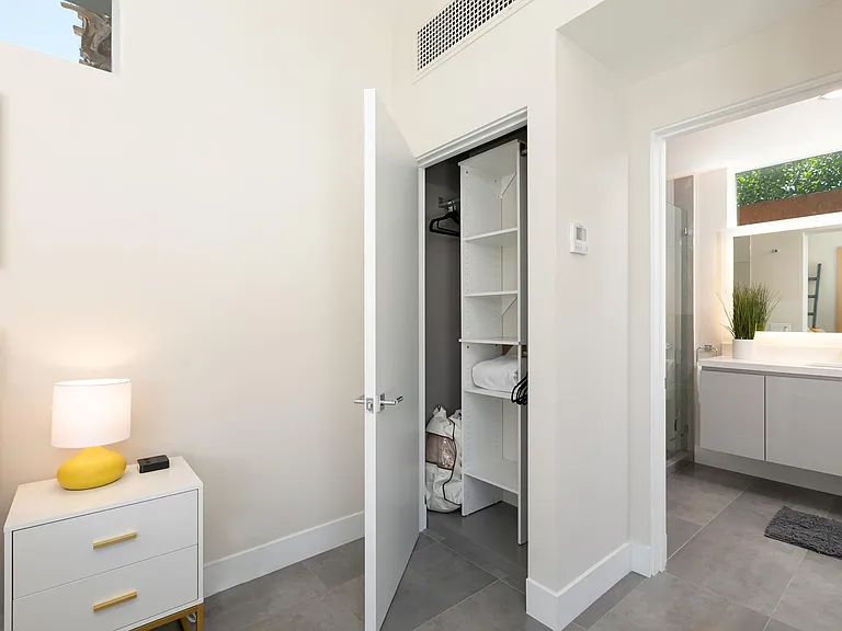Closet of the casita and view to full bath.