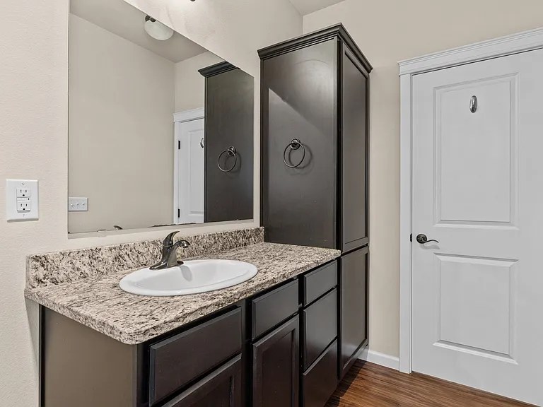 Apartment Bathroom with Granite Countertops