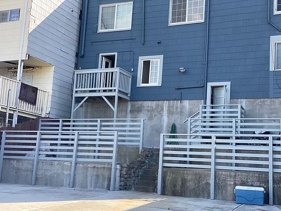 Private small outer deck & entrance to backyard