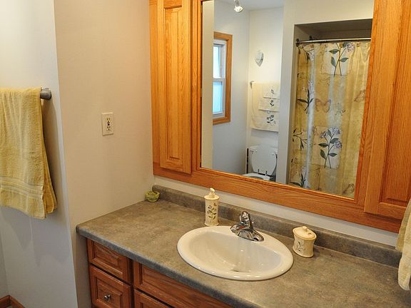 Beautiful bathroom with his and hers custom medicine cabinet