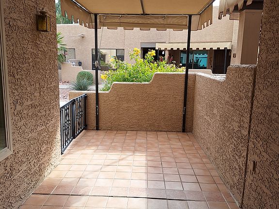 Patio awning includes sunshade