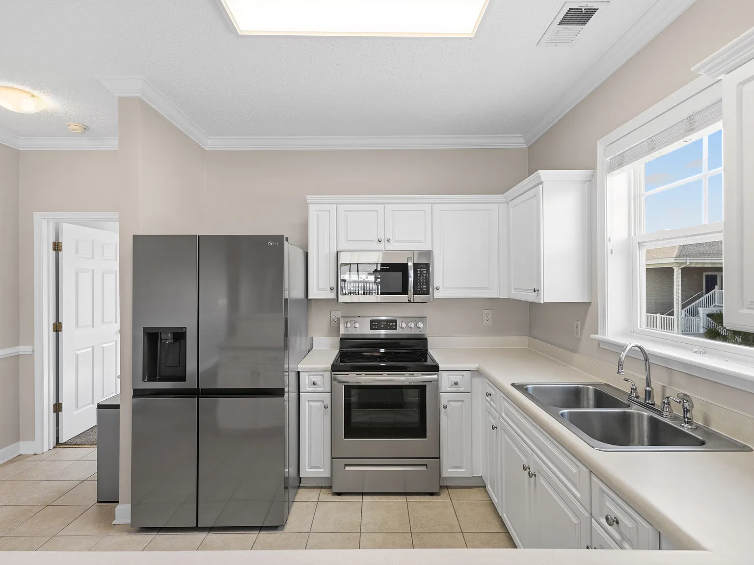 Newer stainless appliances with extra large refrigerator